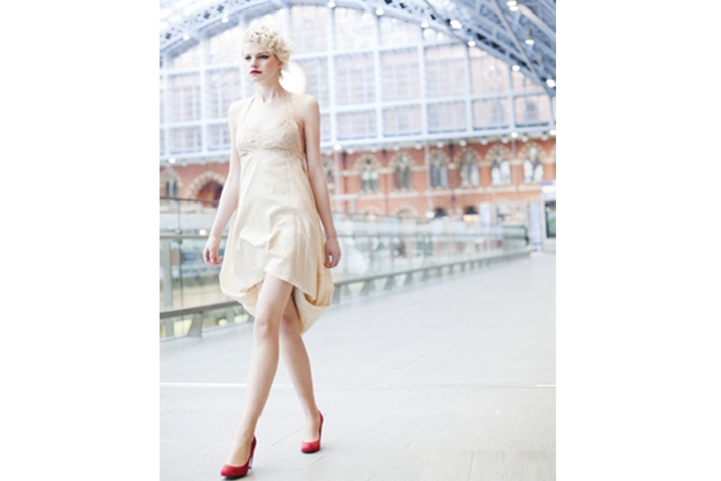 Lady in a wedding dress at St Pancras International Station