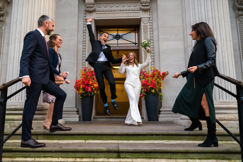 Bride and Groom exiting Town Hall