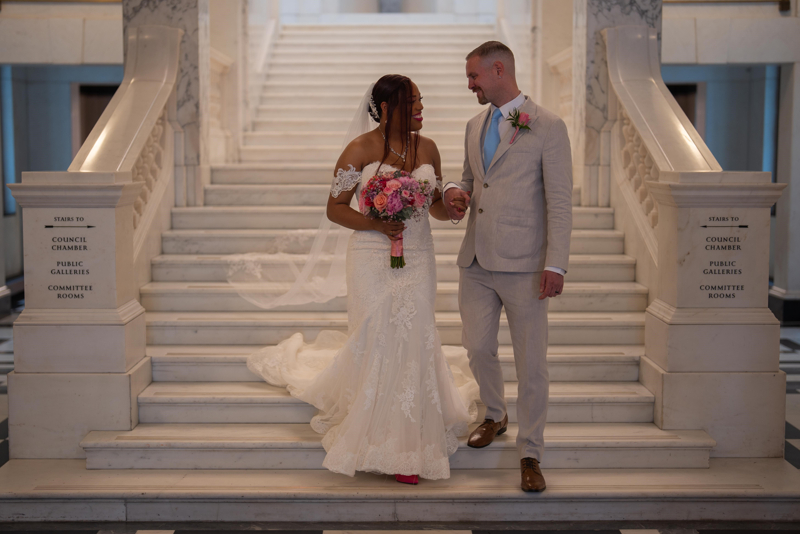 Bride and Groom on Marble Stairs